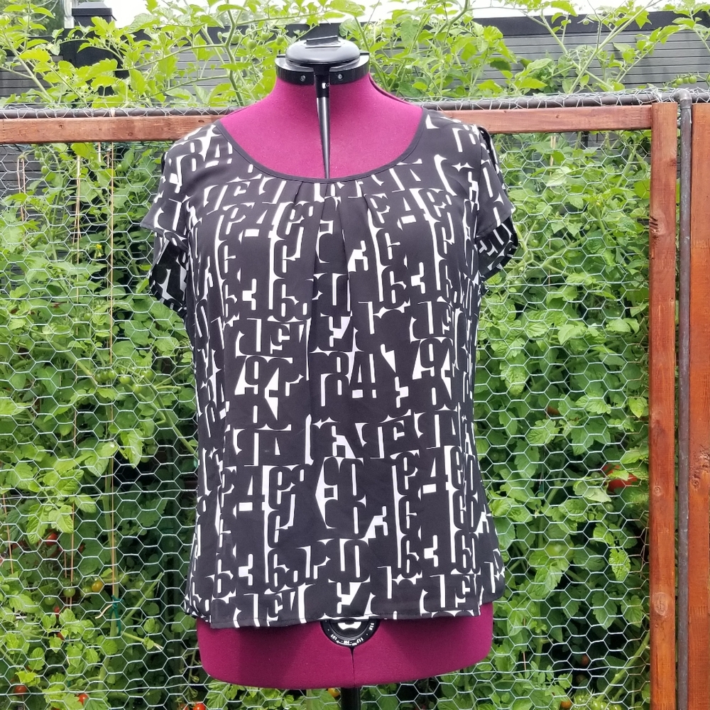 Reitmans graphic black and white blouse.